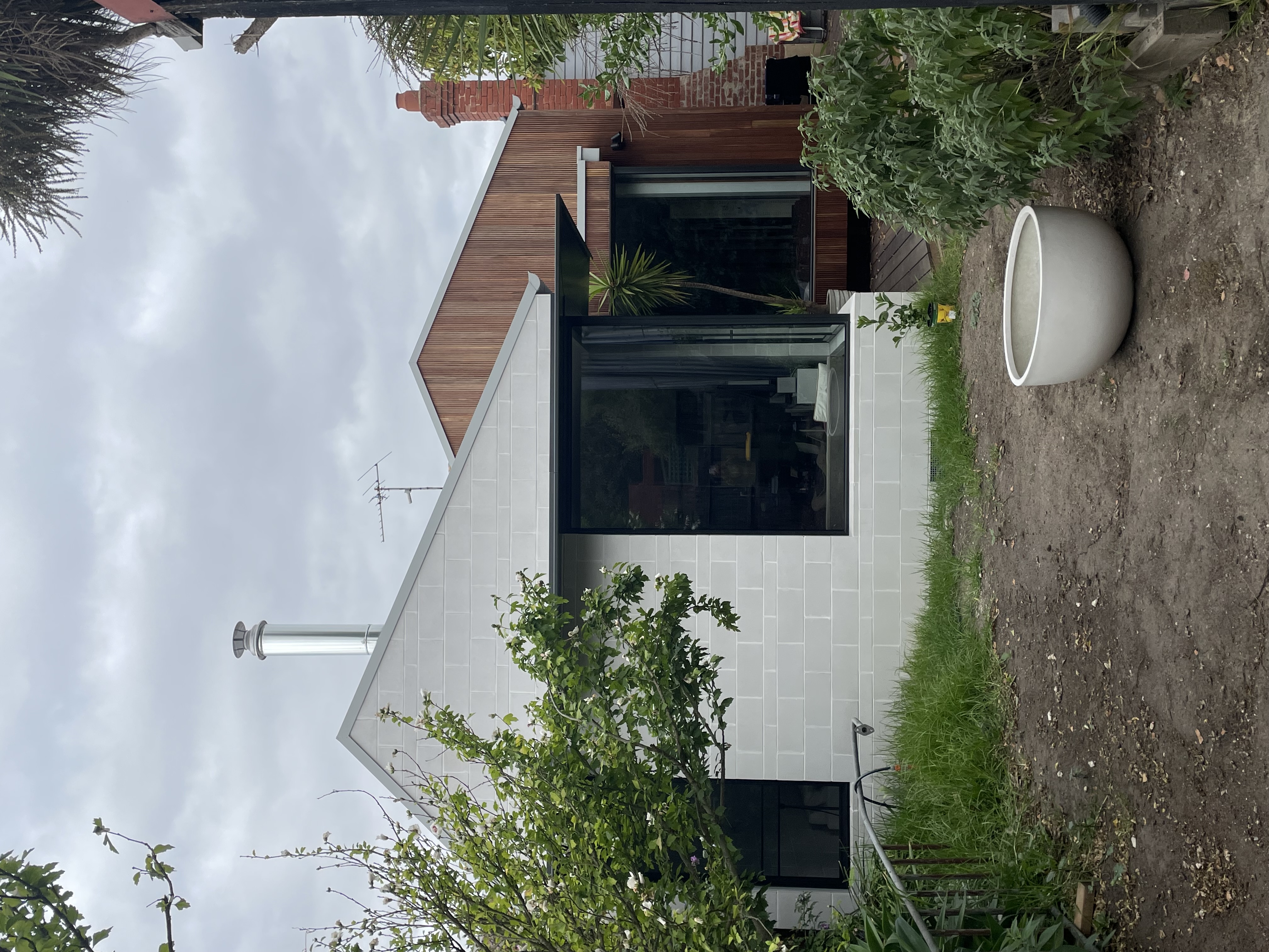 Rear extension exterior — timber deck and garden