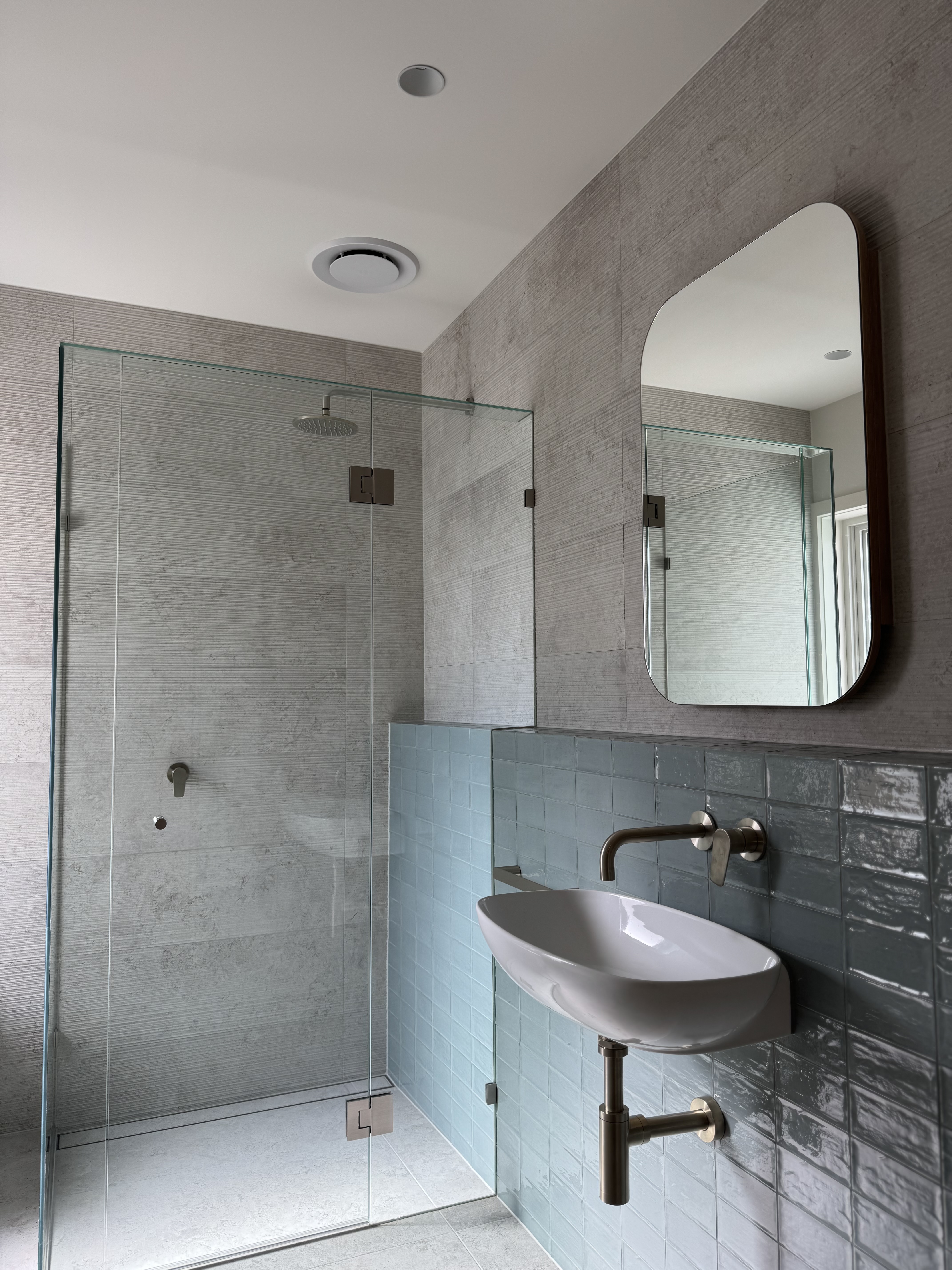 Bathroom design — glass, tile, light